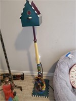 Birdhouse on tall stand