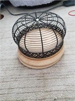 Metal lidded basket on stand