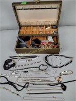 Jewelry box with jewelry including necklaces,