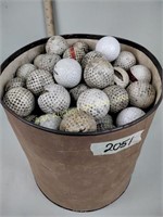 Golf balls, small bucket full, used, some in