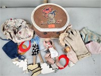Vintage doll clothes in case