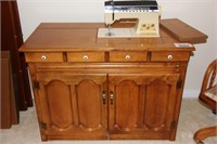 singer sewing machine in console