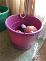 Tub of assorted sports balls