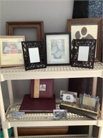 Assorted picture frames and albums