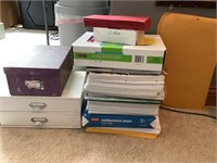 Assorted file folders and paper