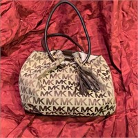 Michael Kors monogram canvas drawstring handbag