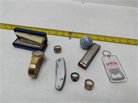 assorted items - harmonica, watch, pocket knife,