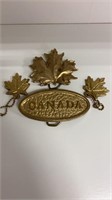 Vintage Canada belt buckles and key chains