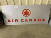 Air Canada sign raised on aluminum