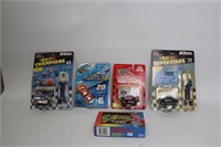 LOT OF NASCAR COLLECTABLE CARS AND PLAYING CARD