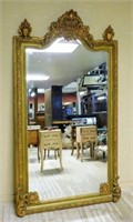 Ornate Urn Finial Gilt Beveled Mirror.