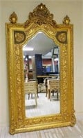 Ornate Urn Finial Gilt Beveled Mirror.
