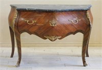 Ormolu Trimmed Marble Top Bombe Commode.