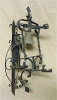 Wrought Iron Figural Wall Mount Bell.