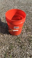 Bucket and 4 packages of trimmer line