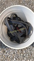 Jumper cables in bucket