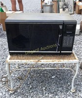 Metal lawn table and Kenmore microwave