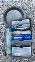 VHS tapes, baking pan, and plastic cups