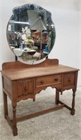 Antique oak vanity with floating beveled mirror