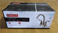 (BC) NIB Lorain lavatory faucet by Delta, brushed