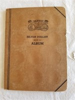 3 Morgan Silver Dollars In Coin Book