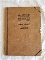 Book With 8 Morgan Silver Dollars