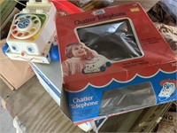 EARLY FISHER PRICE CHATTER PHONE