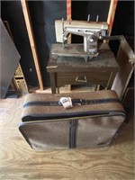 Sewing Machine. with cabinet and Suitcase