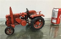 Red tin tractor
