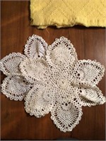 2 floral shaped doily