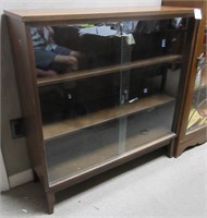 A Retro MCM Walnut Glazed Book Shelf