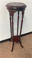 Tall mahogany wood plant stand with one shelf