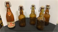 Vintage Grolsch and Henninger beer bottles with