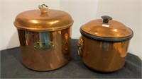 Vintage copper cooking pot and a copper ice
