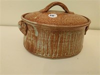 Covered hand thrown pottery casserole