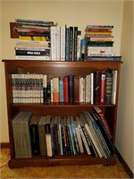 Pine bookshelf with books