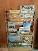 Wooden Upright magazine rack with contents