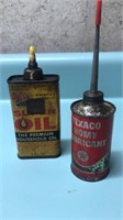 Texaco and liquid wrench oil cans