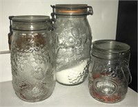 Patterned glass bale top canister set