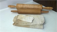 Wooden rolling pins and pastry cloths