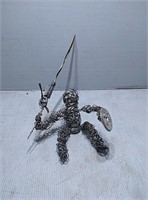 Metal art person with sword