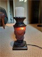 Amber-colored cone design glass body candle stand