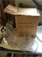 various clear glass table service pieces