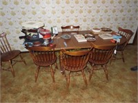 dining room table with six chairs and two leaves