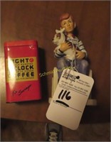 small Rockwell figurine and vintage coffee can