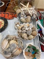 Seashells, sea glass, glass turtle and bowls