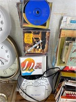 CD/radio/cassette player with CD's