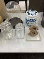 Cookie jars, glass dome display, statue
