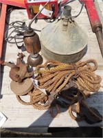 antique hand crank grinder, vintage oil cans and
