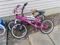 Children's bicycles, patio table and bench